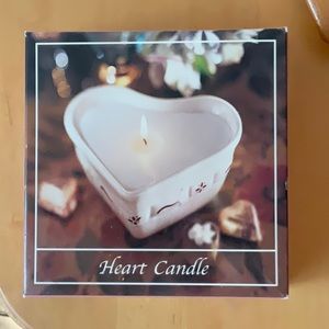 Longaberger heart shaped candle new in plastic wrap Fits in heart shaped dish.